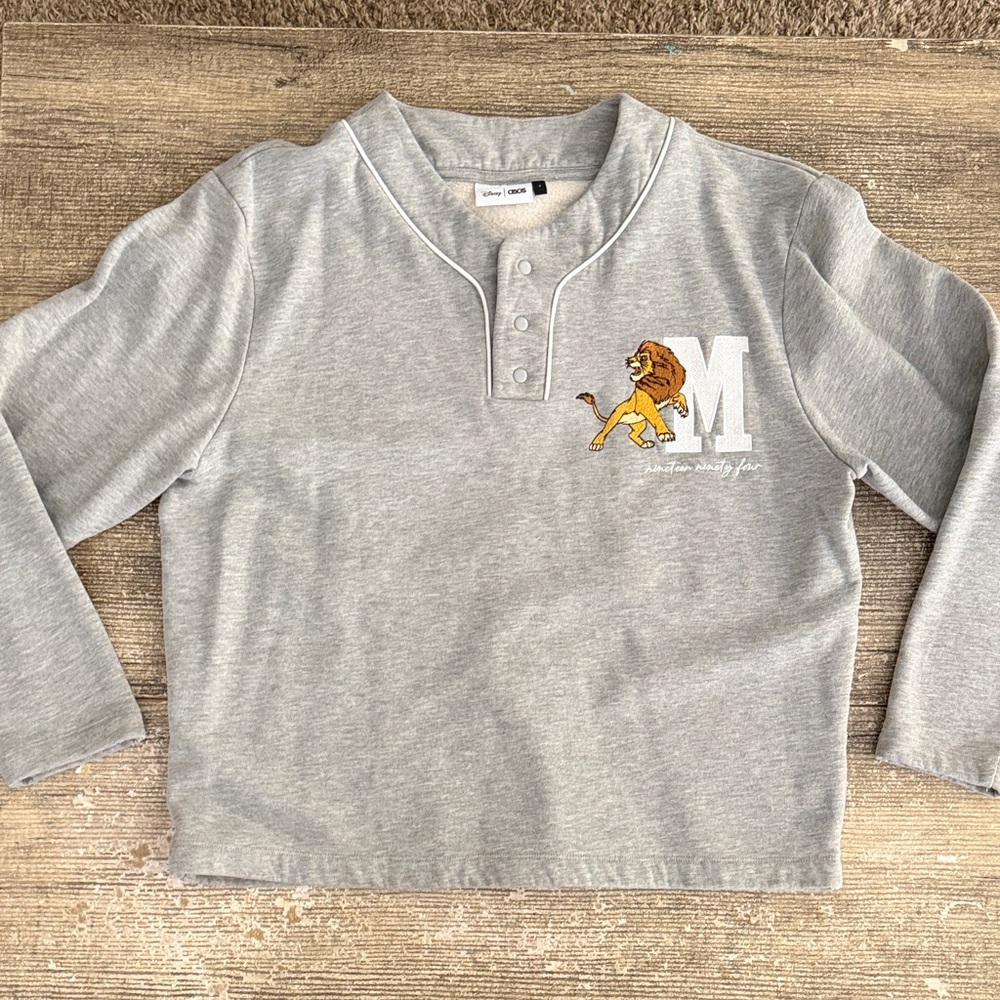 ASOS Disney Lion King embroidered graphic Henley button pullover sweatshirt